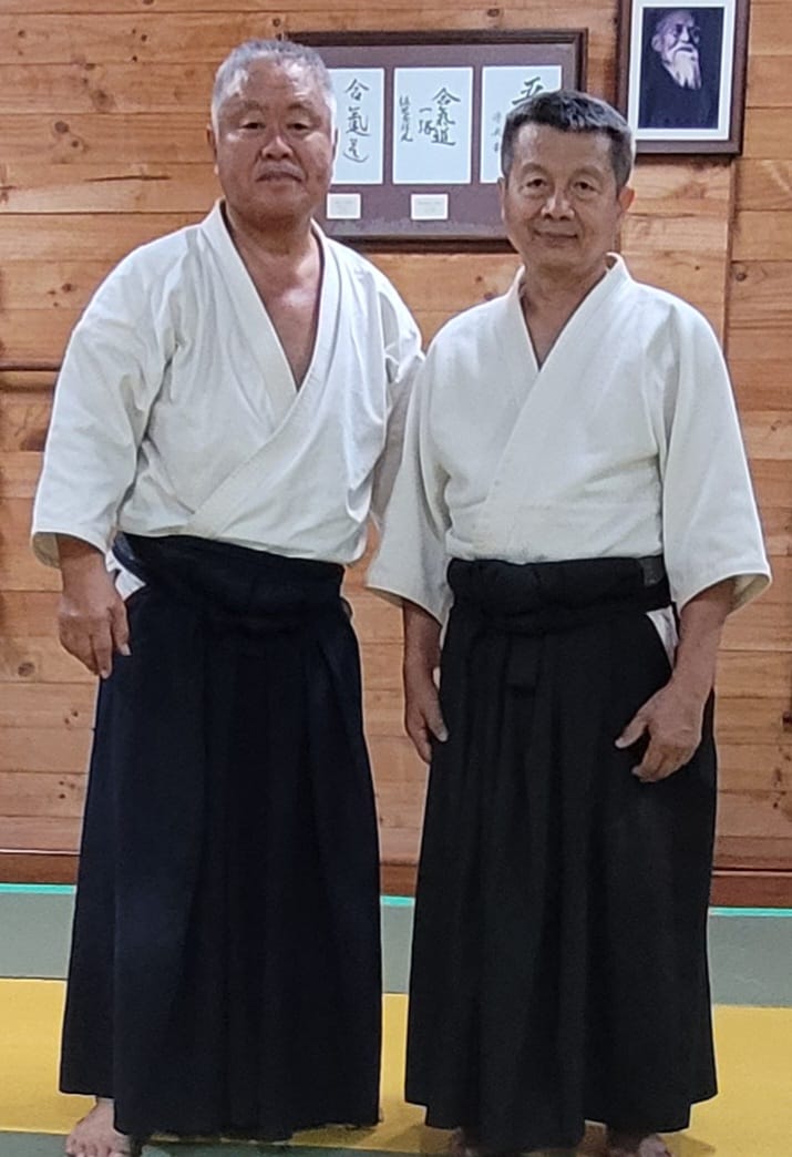 Two Men in Japanese Dresses Standing Side by Side