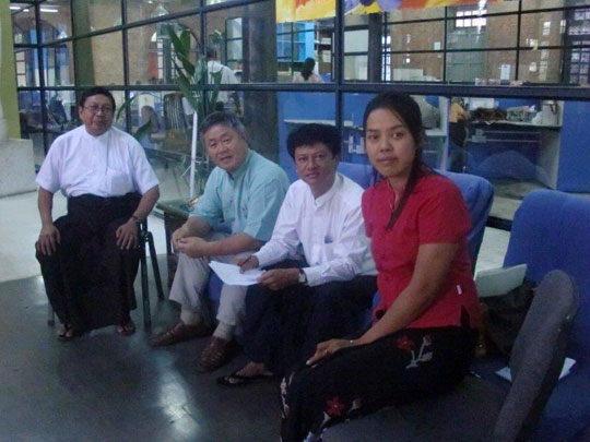 A visit to the Myanmar Times English newspaper headquarters. Second from the front, Agriculture reporter Mr. Myo Lwin. Behind (last); my father; Senior Editor Than Aung.