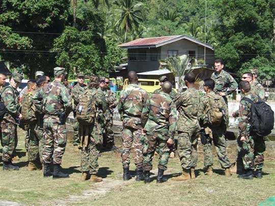 Medical mission soldiers arrive in the village.