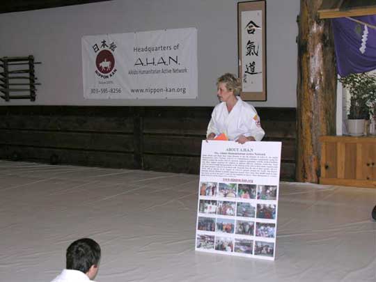 Emily Busch Sensei talks about AHAN with youth program members and parents.