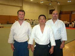 From right: Nippon Kan Assistant Instructor Michael Barrera, center; Dento Iwama Ryu Hitohiro Saito Jukucho,Shin Shin Aiki Shuren Kai Tanren Juku, Iwama, Japan. Left; Nippon Kan Instructor Rick Thompson.
