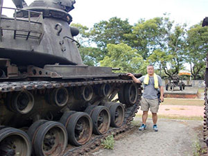 Symbol of war; a US tank long abandoned- for the Vietnamese, a symbol of victory