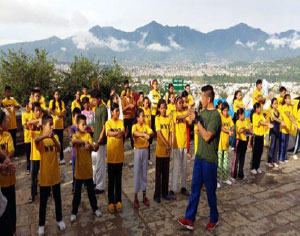 A Group of Children in Matching Yellow Shirts